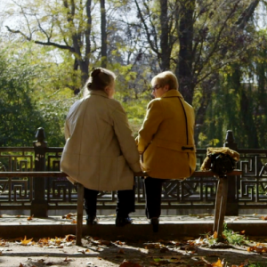 Hospice and Palliative Care in New York, two people on park bench