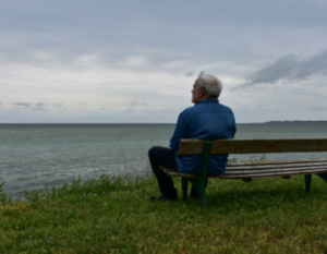 Man staring at the ocean