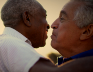 Two men hugging